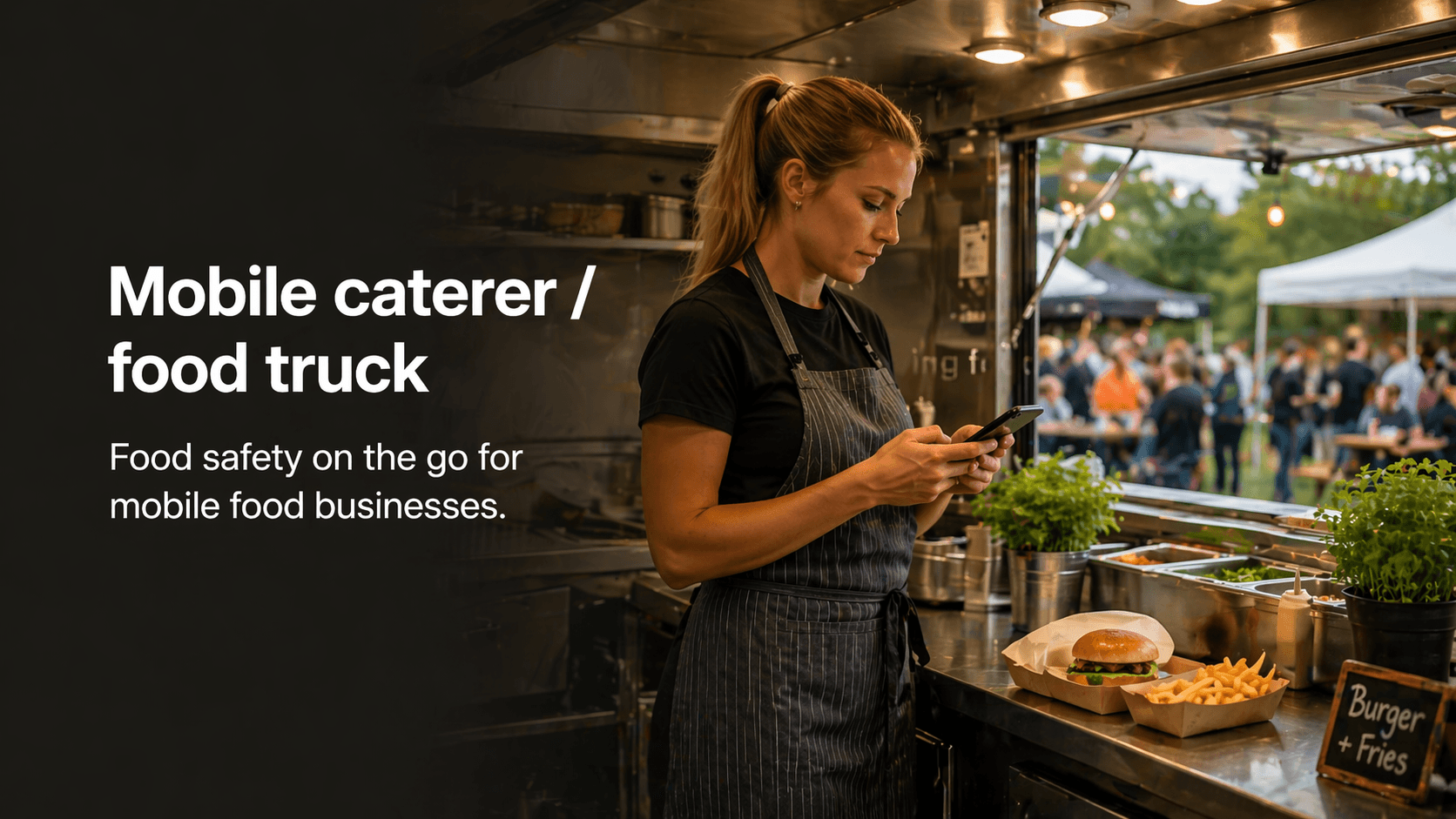 Food truck or mobile caterer using a phone to record food safety checks.